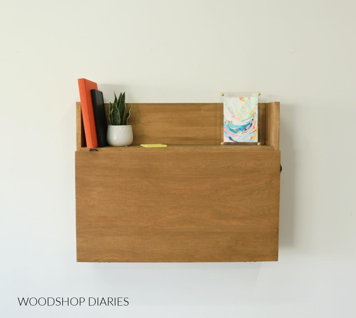DIY Wooden Murphy Desk in Closed position hanging on wall