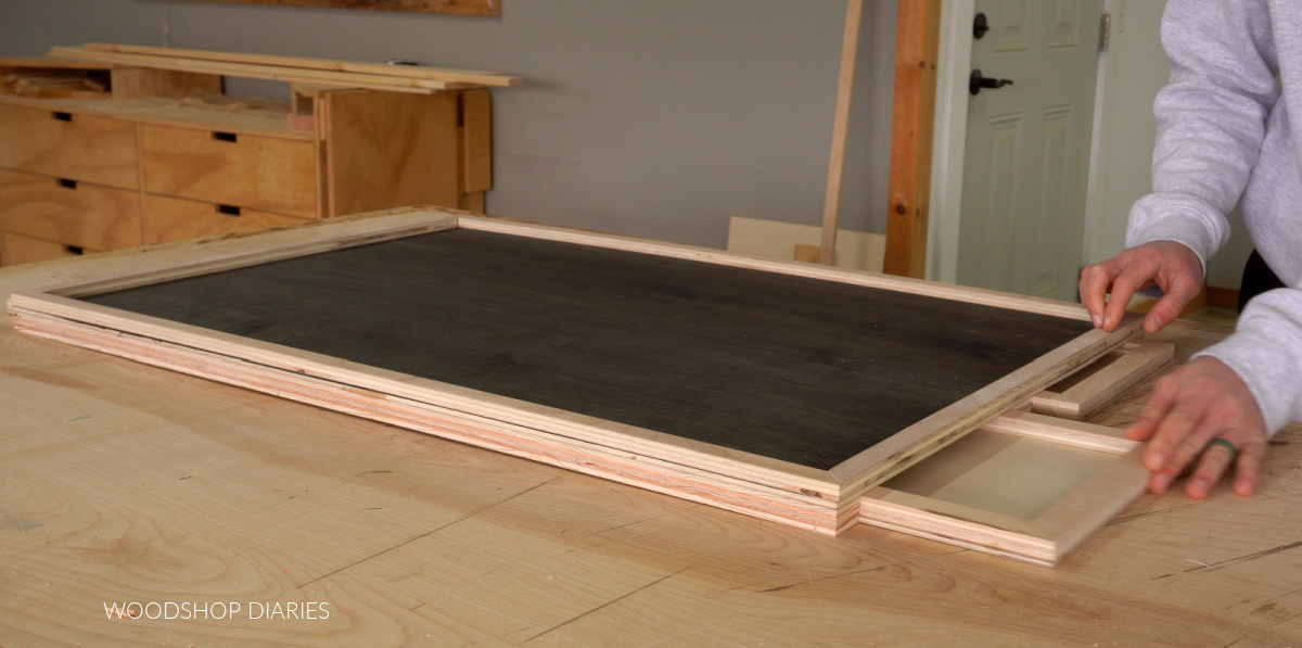 Shara Woodshop Diaries sliding drawers into puzzle board frame