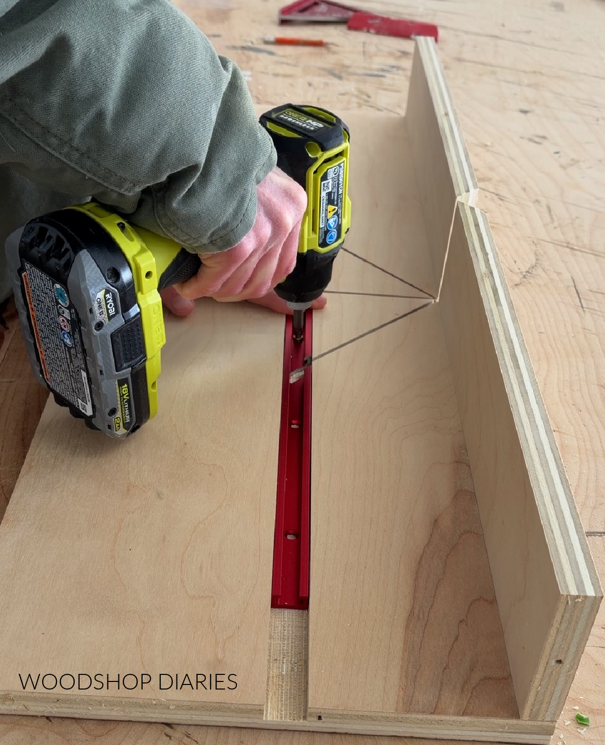 Shara Woodshop Diaries securing t tracks into jig with screws