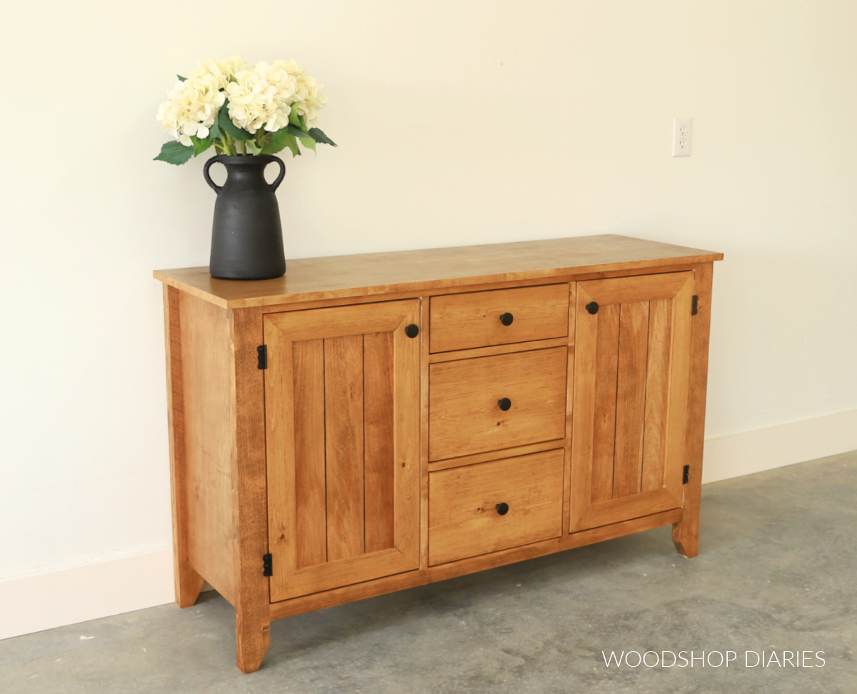 Completed DIY buffet table with storage. Two doors on each side plus drawers in the middle section