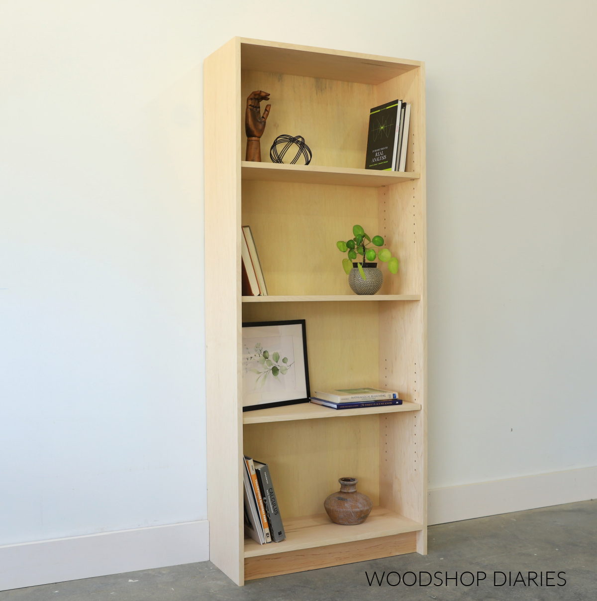Simple DIY plywood bookcase with adjustable shelves