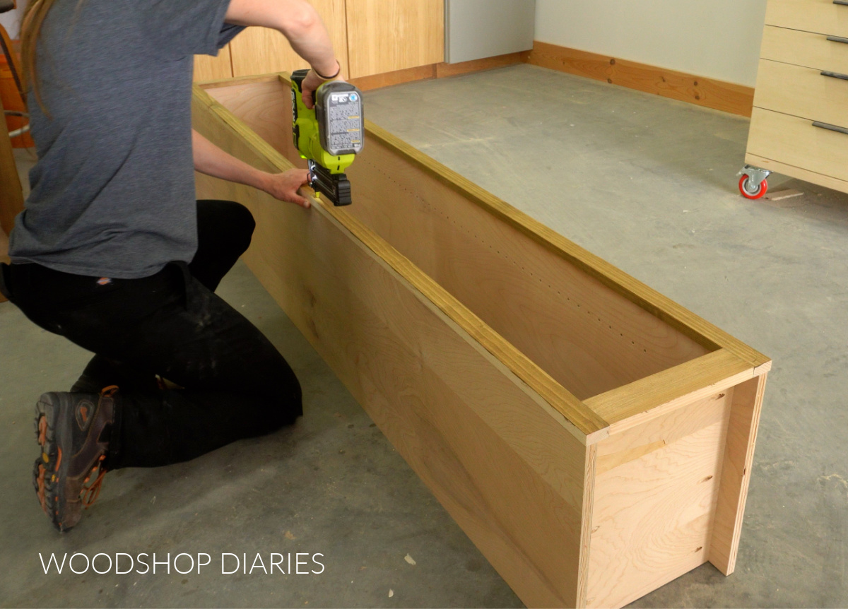 Shara Woodshop Diaries nailing face frame onto front of tall skinny cabinet box for closet tower