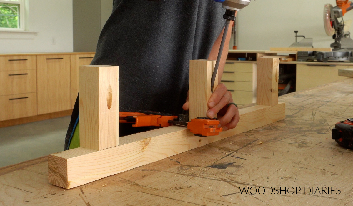 Shara Woodshop Diaries installing shelf supports onto back board of frame