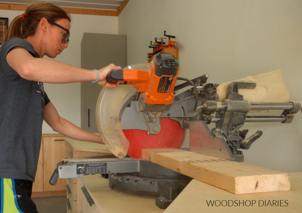 Shara Woodshop Diaries cutting 2x6 board on miter saw