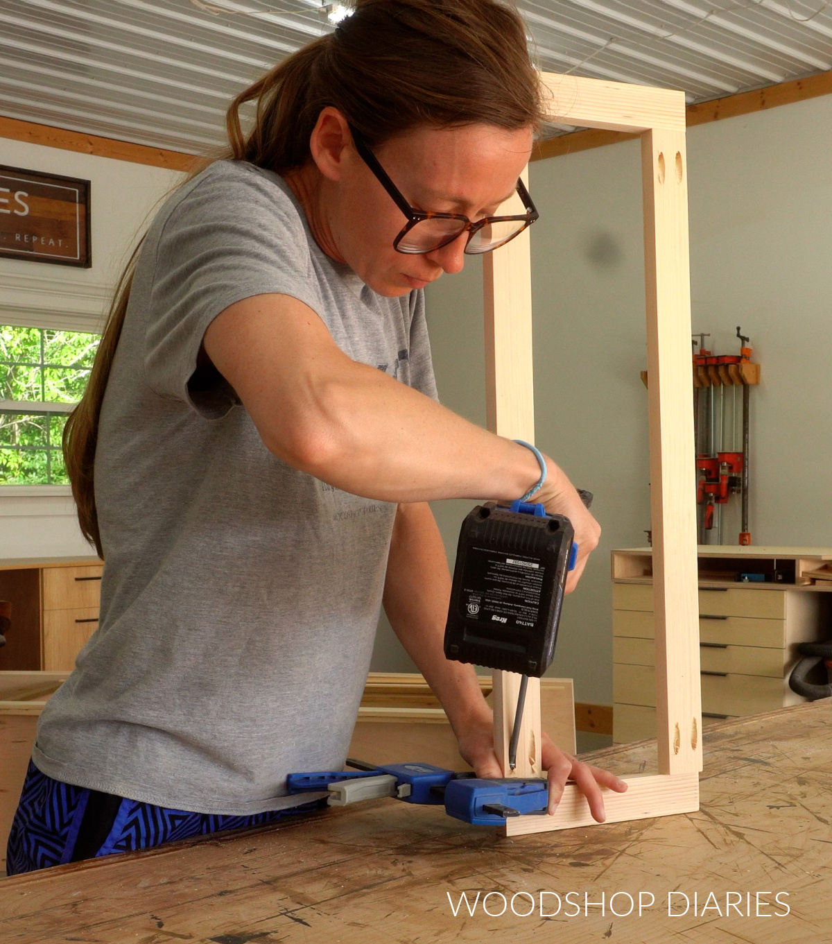 Shara Woodshop Diaries assembling drawer front frame on workbench using pocket holes