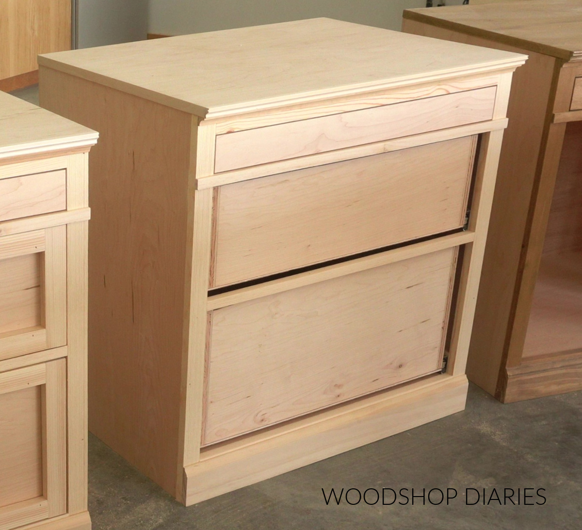 DIY 3 drawer base cabinet without drawer fronts unfinished in workshop