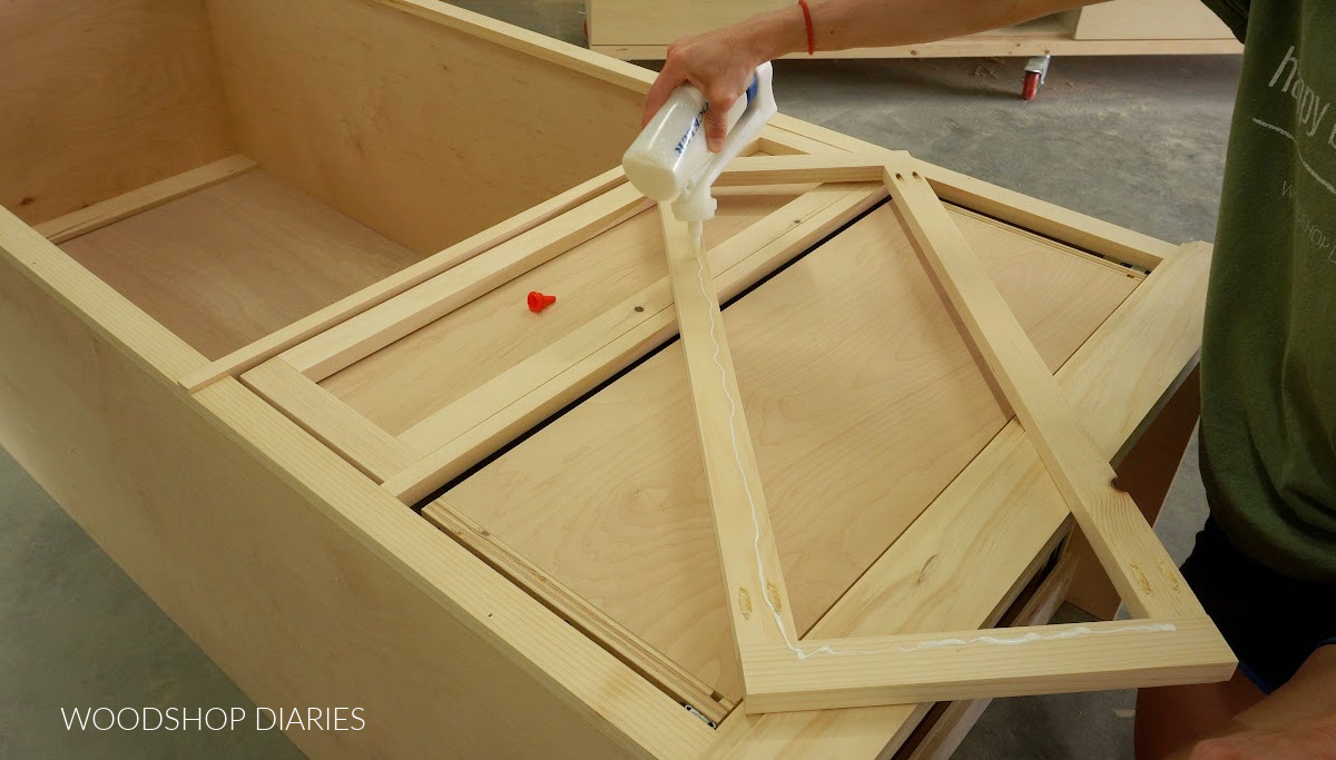 Shara Woodshop Diaries applying wood glue to drawer front frame