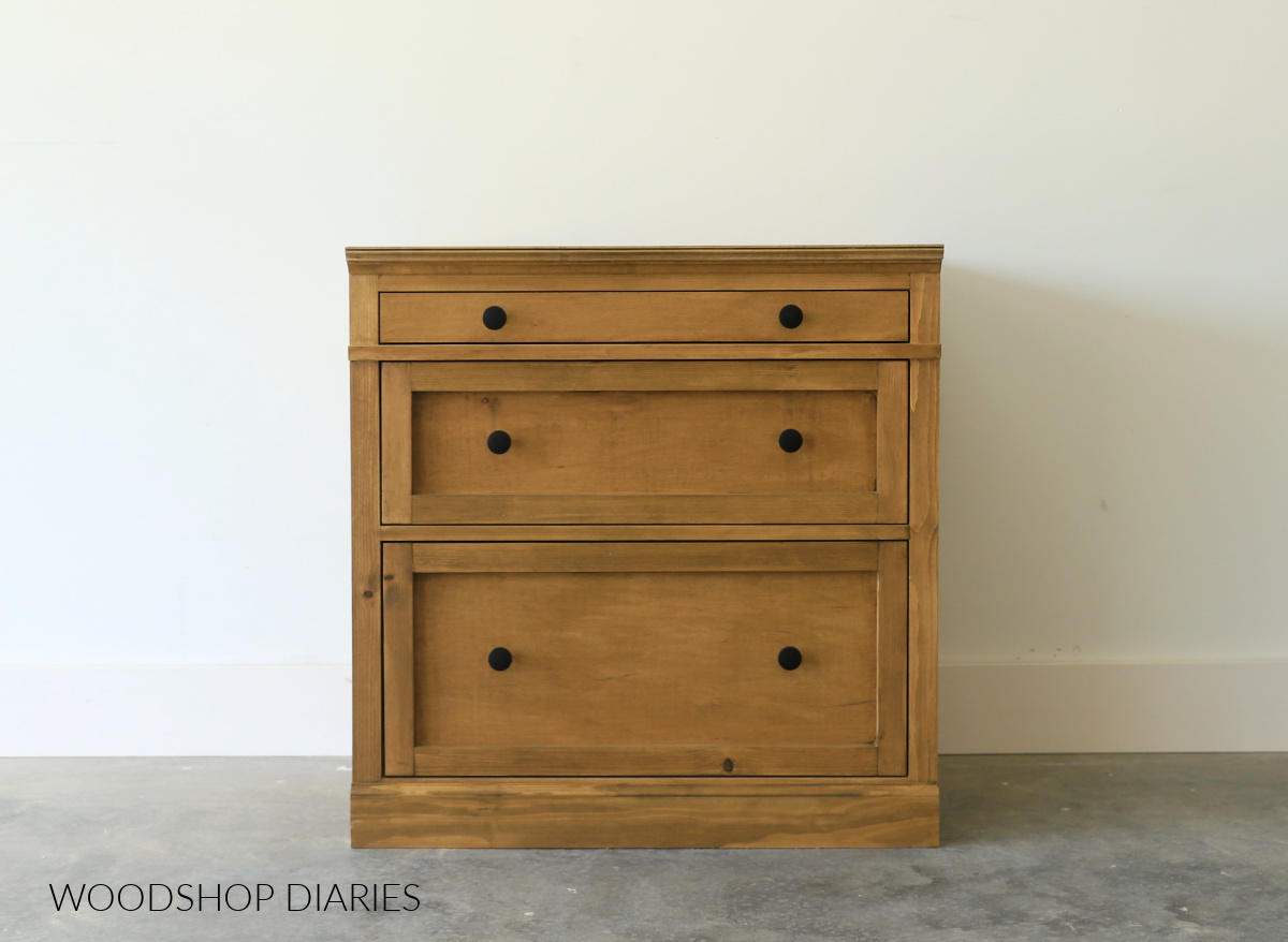 Finished and stained wide 3 drawer DIY base cabinet box with black knobs
