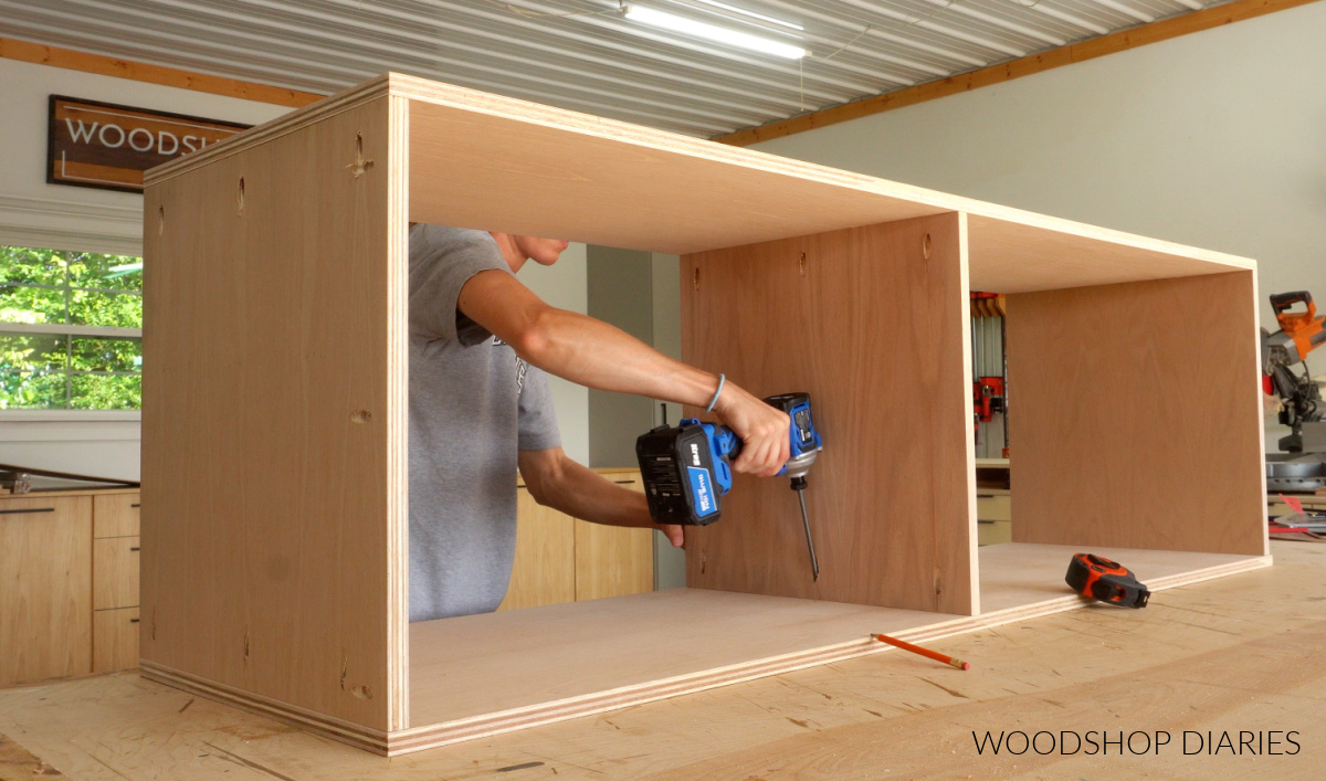 Shara Woodshop Diaries assembling plywood cabinet box on workbench