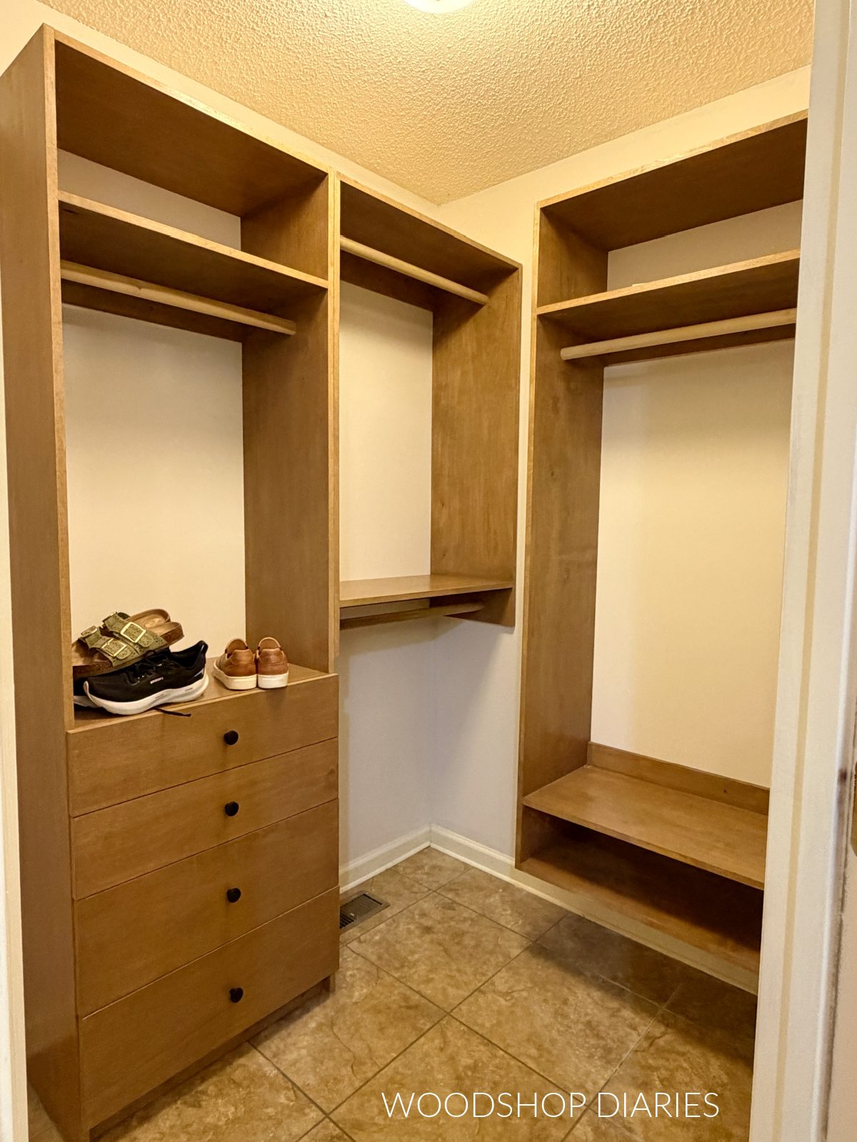 Custom plywood cabinets installed in closet