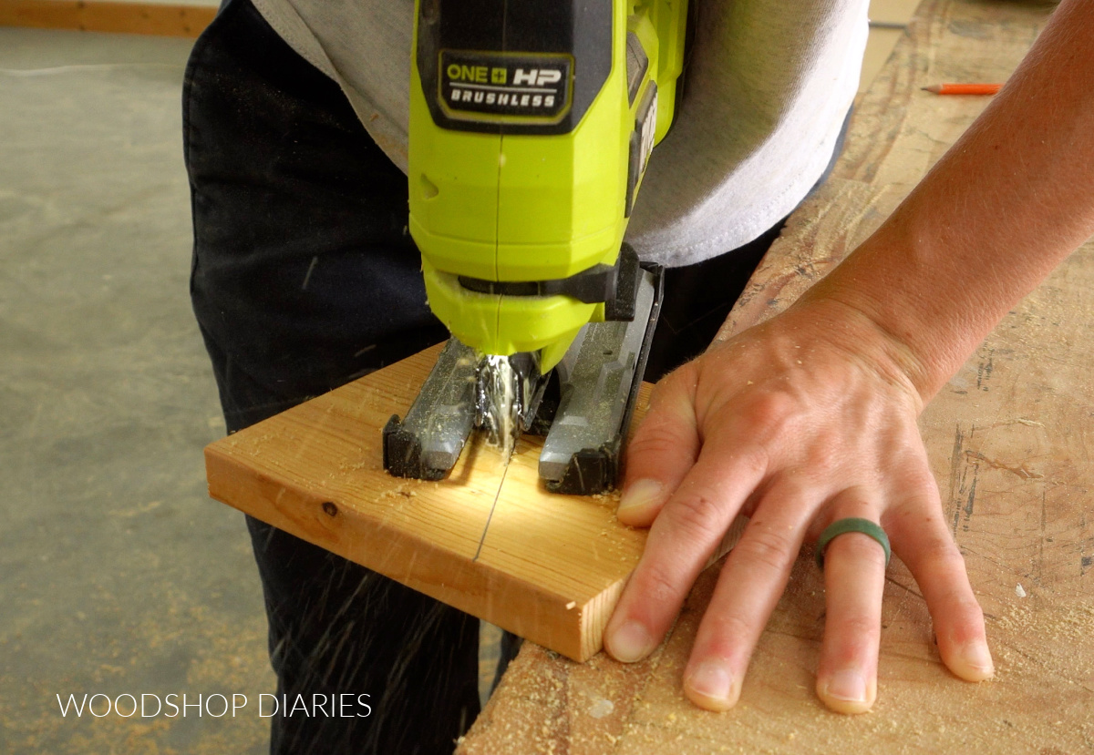 Close up of jig saw cutting along diagonal line on 1x6 board