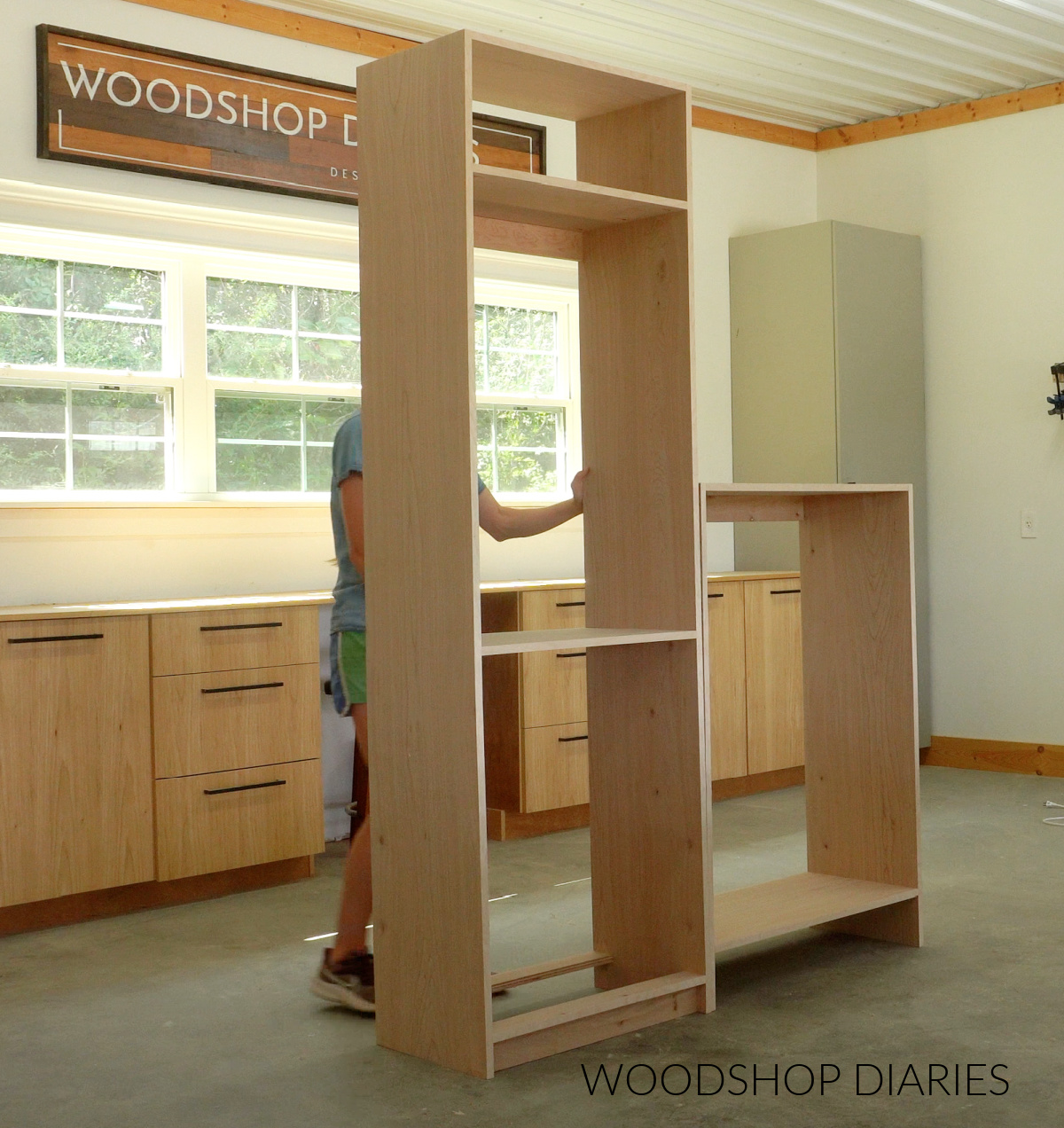 Tall closet cabinet assembled in workshop standing upright