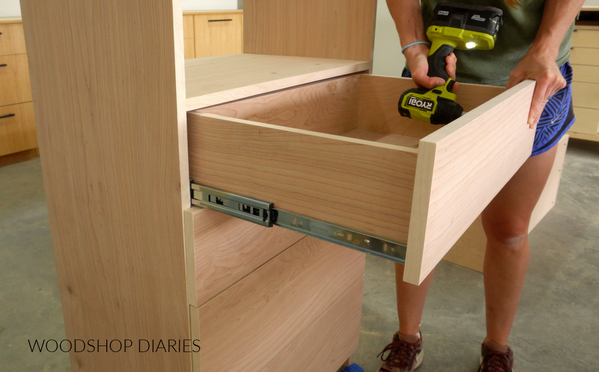 Shara Woodshop Diaries securing drawer front onto drawer in closet system