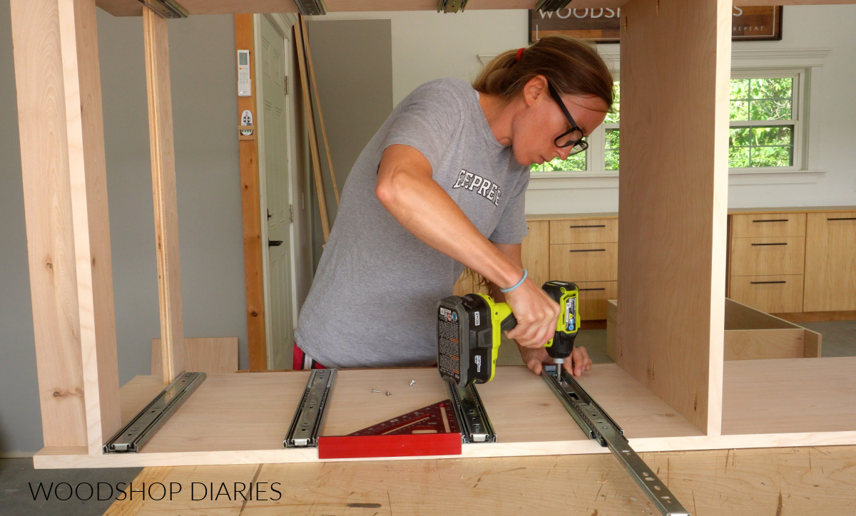 Shara Woodshop Diaries installing drawer slides into closet cabinet
