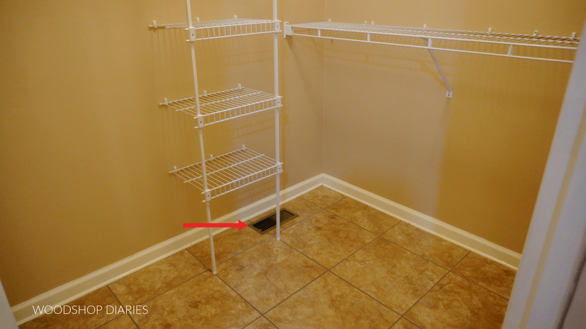 Closet before image showing floor vent location