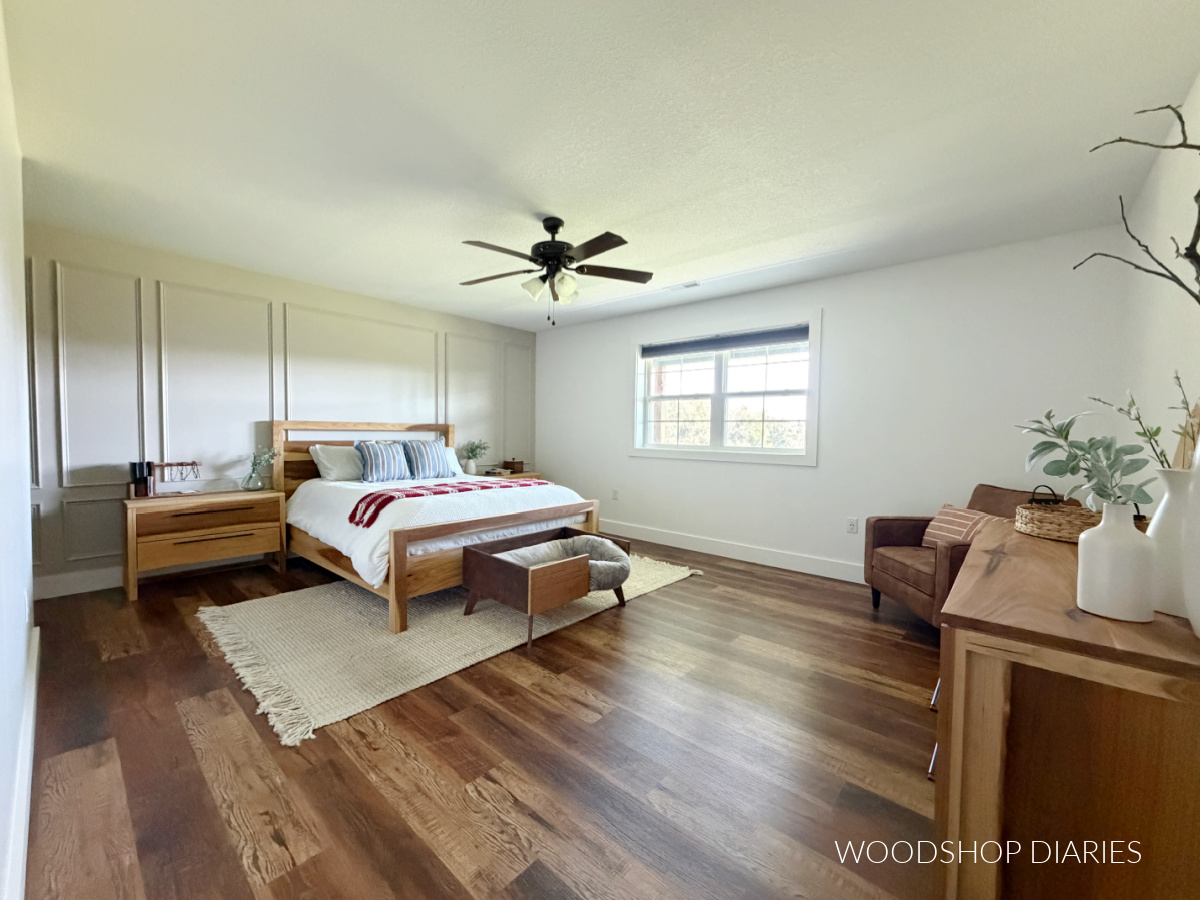 Bright modern bedroom after refresh of new picture frame molding and fresh coat of white paint