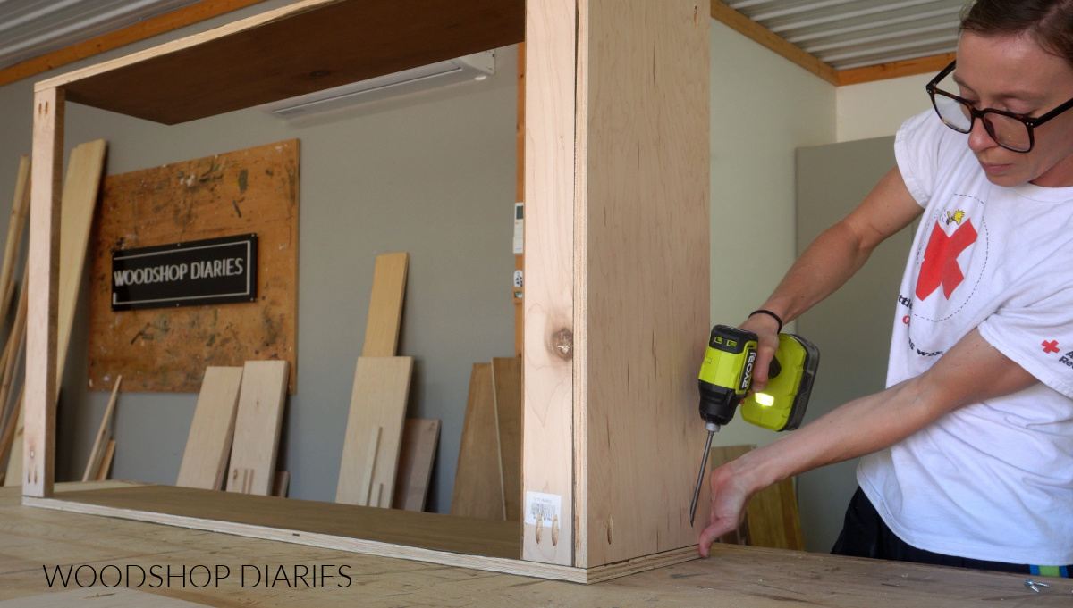 Shara Woodshop Diaries assembling bookcase hutch cabinet with pocket holes and screws on workbench