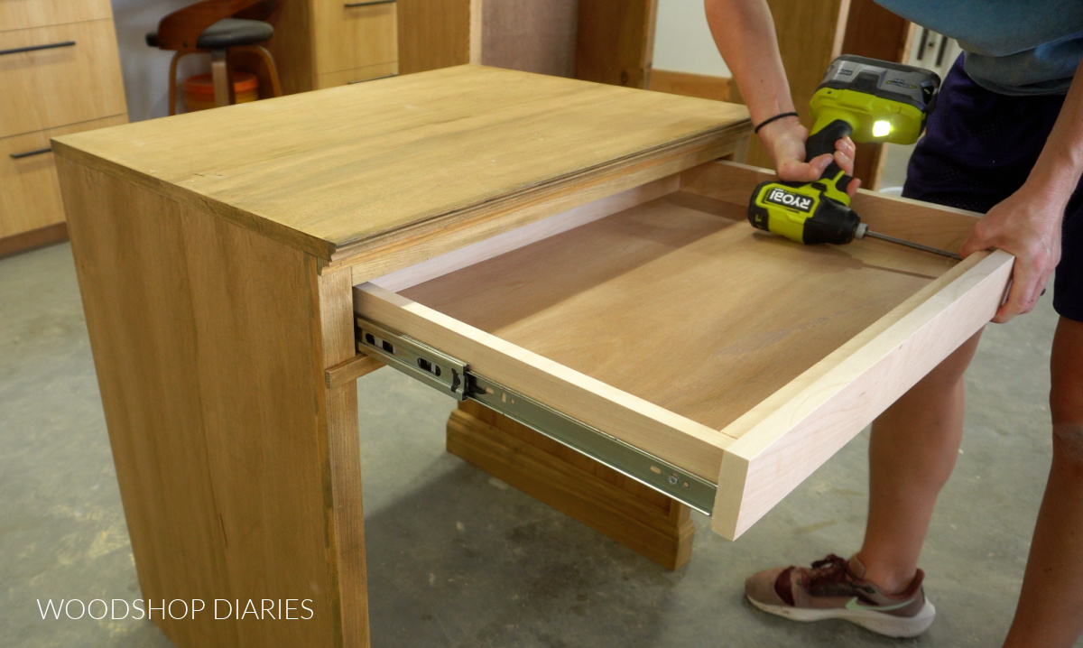 Shara Woodshop Diaries installing drawer front onto shallow writing desk drawer