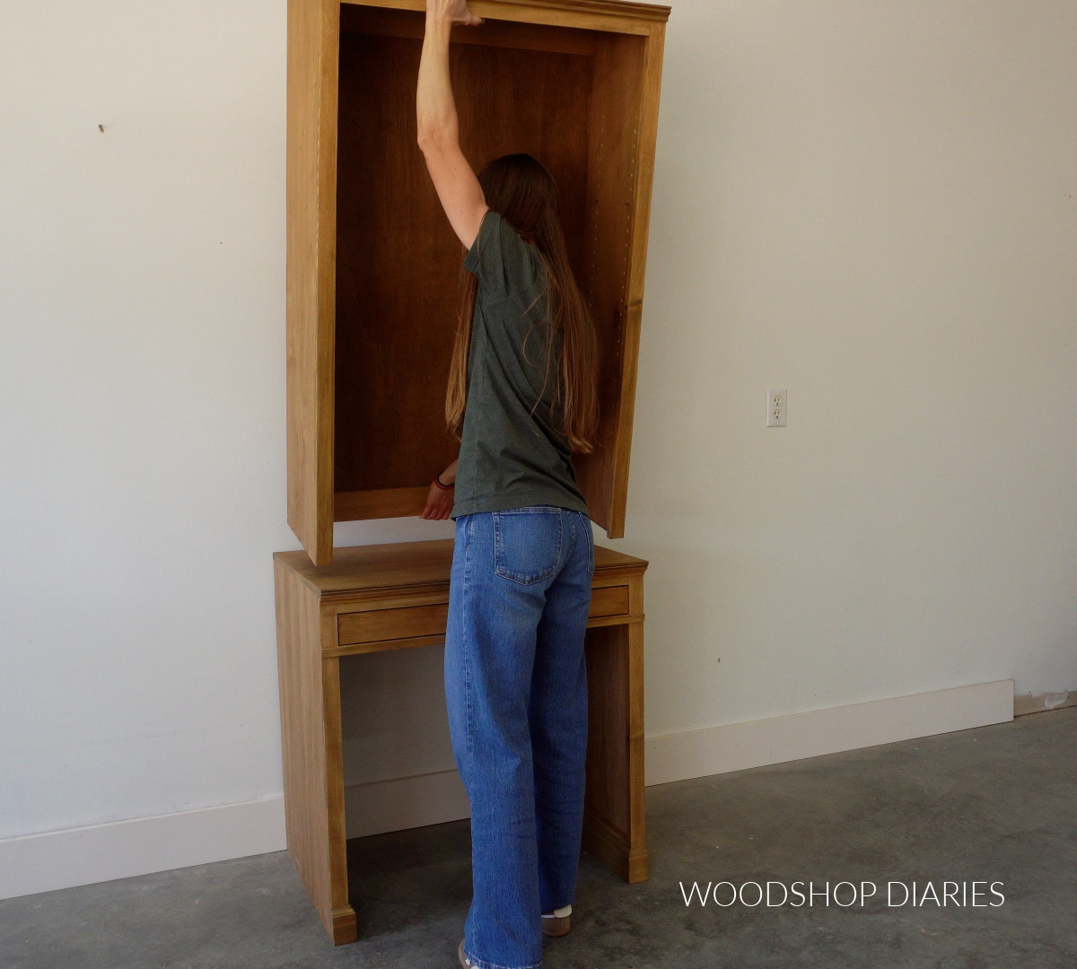 Shara Woodshop Diaries placing hutch onto writing desk